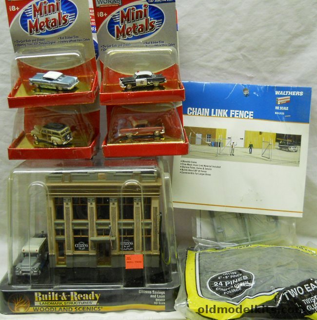 Woodland Scenics 1/87 BR5003 Citizens Savings and Loan / TR1105 24 Realistic Pine Trees / Walthers 933-3125 Chain Link Fence / Mini Metals 1953 Ford Police Car / 1953 Ford Victoria / 1958 Chevrolet Impala / 1948 Ford Woody Wagon - HO Scale plastic model kit